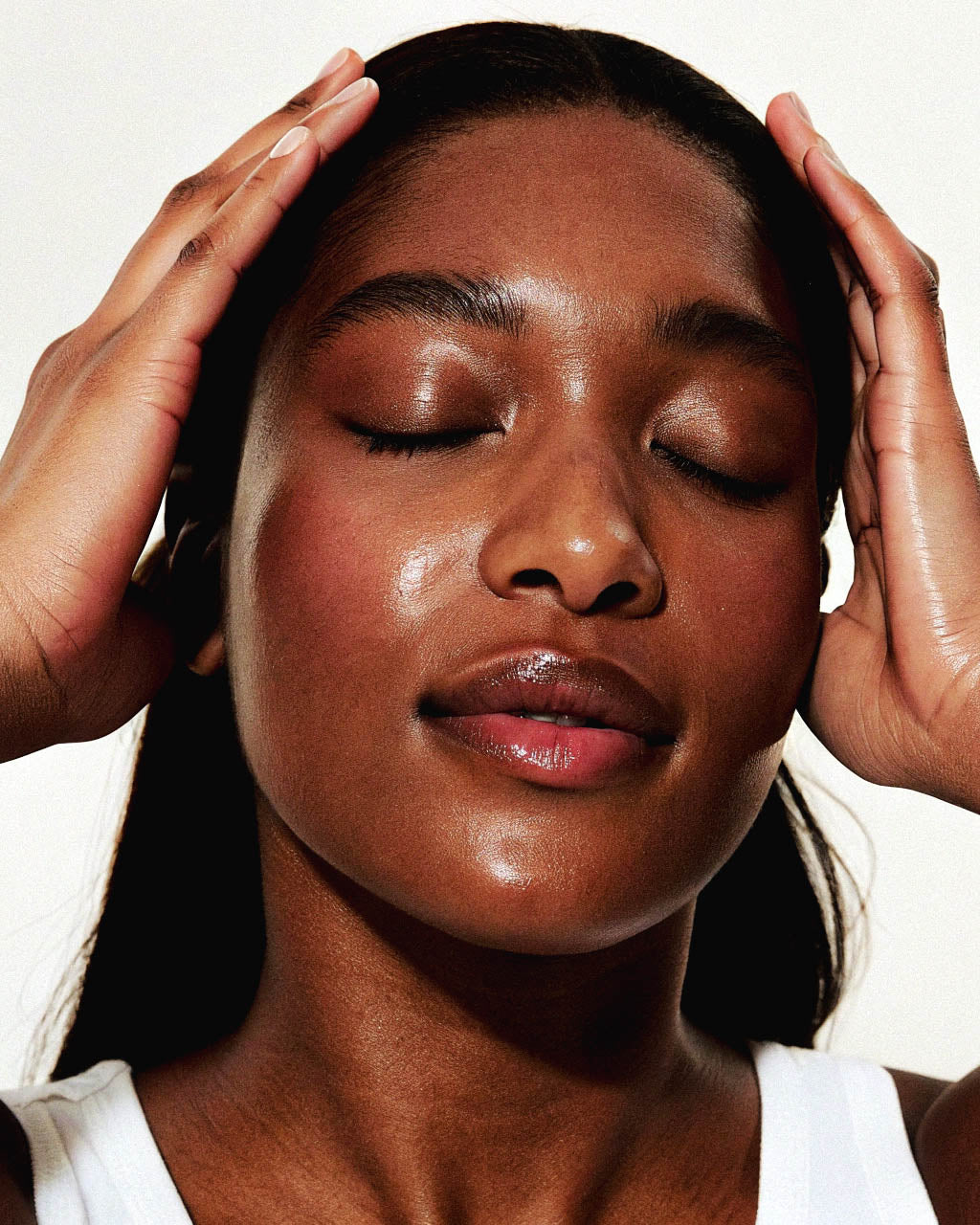 Woman with her eyes closed, hands on her head against a white background. Best skincare serum
2. Vitamin C serum
3. Face serum for glowing skin
4. Anti-aging serum
5. Hydrating face serum
6. Vegan cruelty-free skincare serum
7. Natural anti-aging face serum
8. Serum for acne-prone skin
9. Collagen boosting serum
10. Buy face serum online