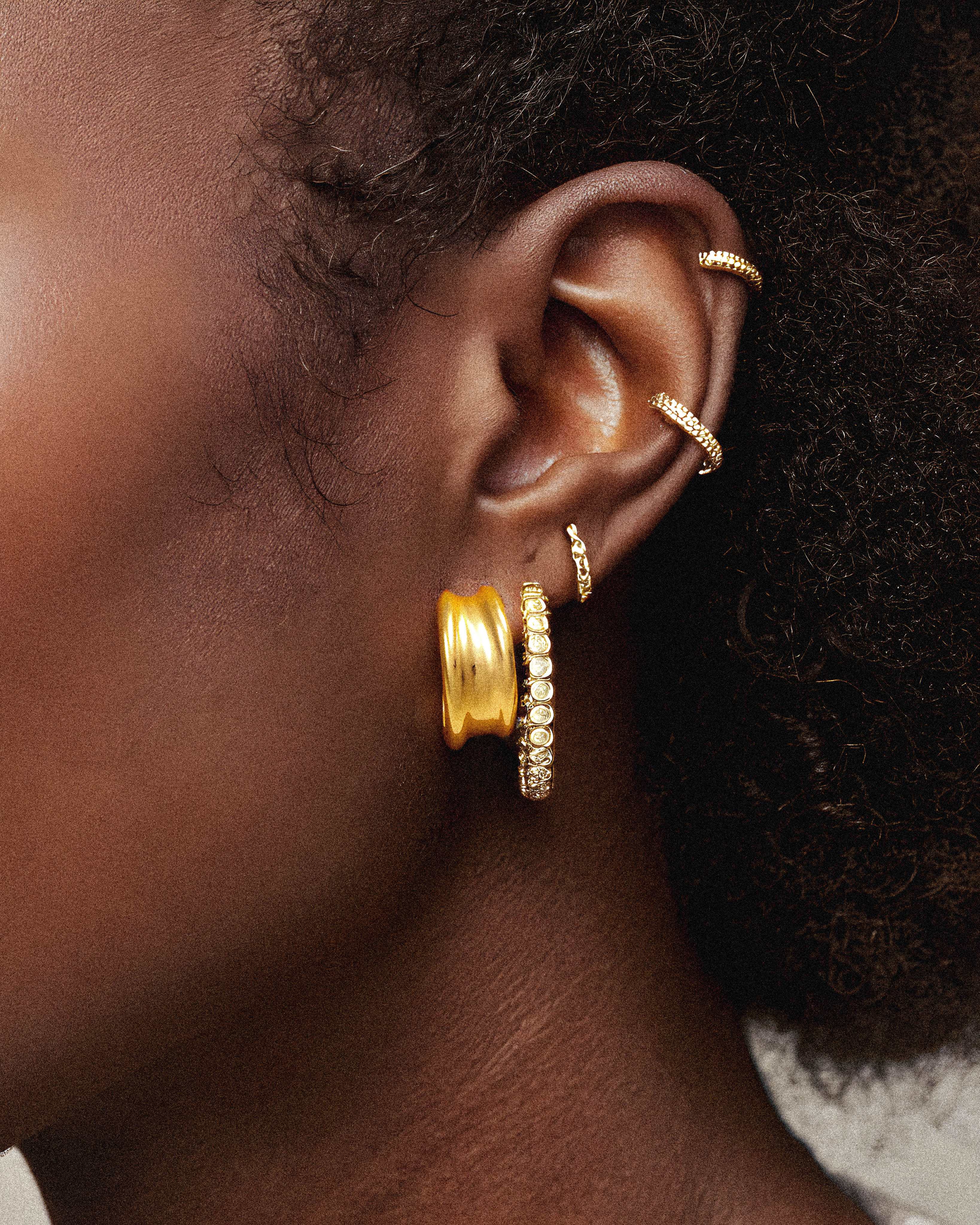 Dawn Earrings showcase a refined design that captures the subtle beauty of early morning light. Crafted with precision, these earrings offer a sophisticated accessory suitable for both professional and elegant occasions. Their balanced form enhances any outfit with understated elegance, making them a versatile addition to your jewelry collection.
1. 18k gold plated jewelry
2. gold plated stainless steel jewelry
3. tarnish free gold jewelry
4. waterproof gold jewelry
5. affordable gold jewelry
6. non-t