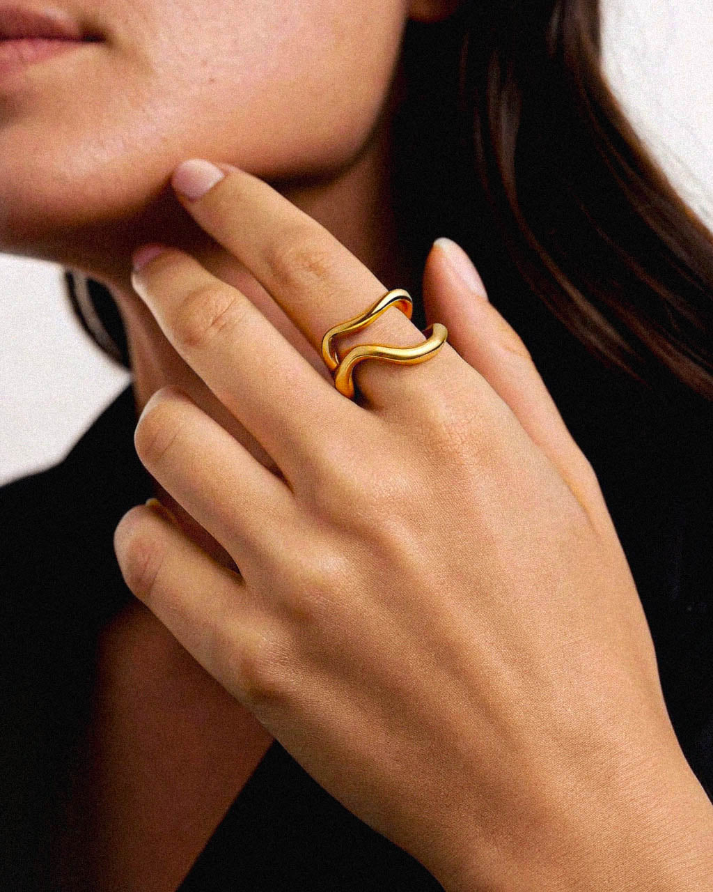 The Amberfall Ring is a finely crafted, minimalistic piece made from 18k gold. Its small, elegant design offers a subtle yet sophisticated accent, perfect for those who appreciate understated and craftsmanship. Ideal for everyday wear or special occasions, this ring combines timeless style with durable quality.