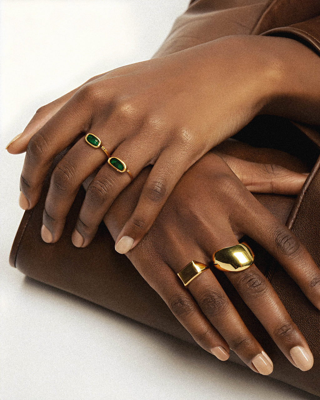 Ather ring

The Aether Ring is a bold statement piece crafted with a solid, substantial design and finished in luxurious 18k gold plating. Its impressive size and rich gold tone offer a timeless making it an ideal accessory for those seeking both durability and refined style. Perfect for elevating any outfit, this ring combines expert craftsmanship with classic sophistication. on a model