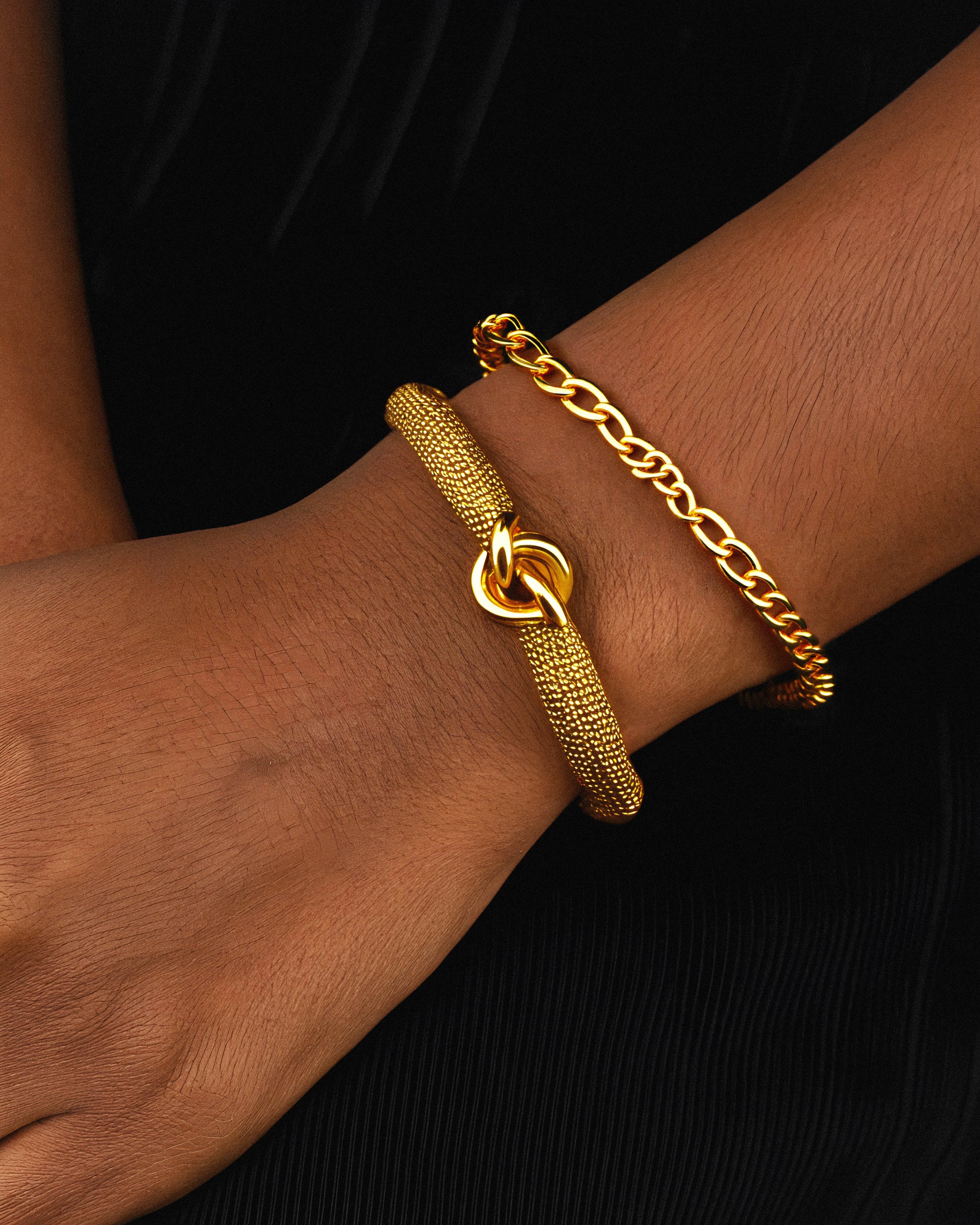 Elevate your collection with the Opaline Bracelet, crafted in luxurious 18k gold. This finely designed piece offers a timeless elegance that complements both everyday wear and special occasions. Its high-quality gold ensures lasting shine and durability, making it a sophisticated addition to any jewelry ensemble. Perfect for those who appreciate craftsmanship. 1.	18k gold plated jewelry
	2.	gold plated stainless steel jewelry
	3.	tarnish free gold jewelry
	4.	waterproof gold jewelry
	5.	affordable gold jewe