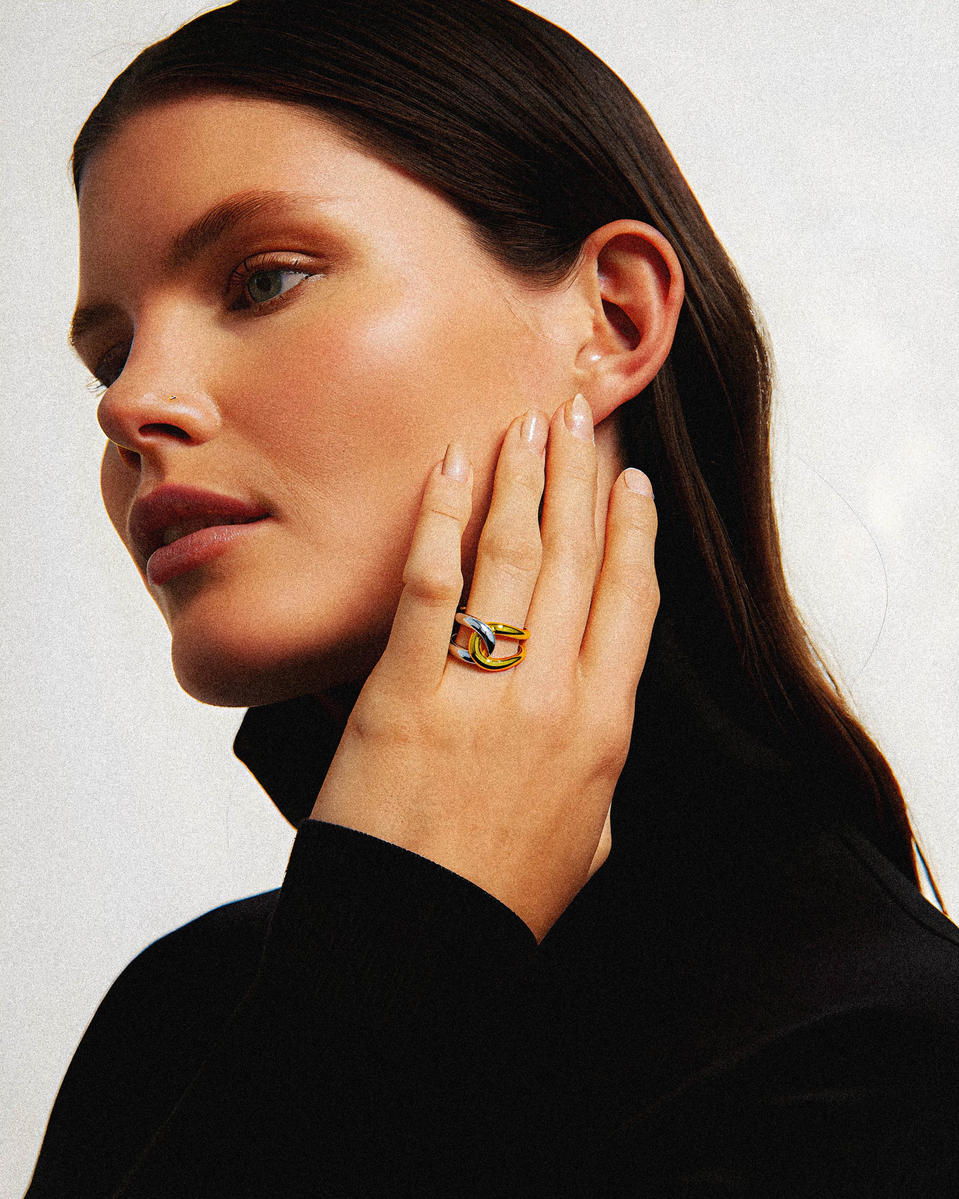 Ather ring

The Aether Ring is a bold statement piece crafted with a solid, substantial design and finished in luxurious 18k gold plating. Its impressive size and rich gold tone offer a timeless making it an ideal accessory for those seeking both durability and refined style. Perfect for elevating any outfit, this ring combines expert craftsmanship with classic sophistication.