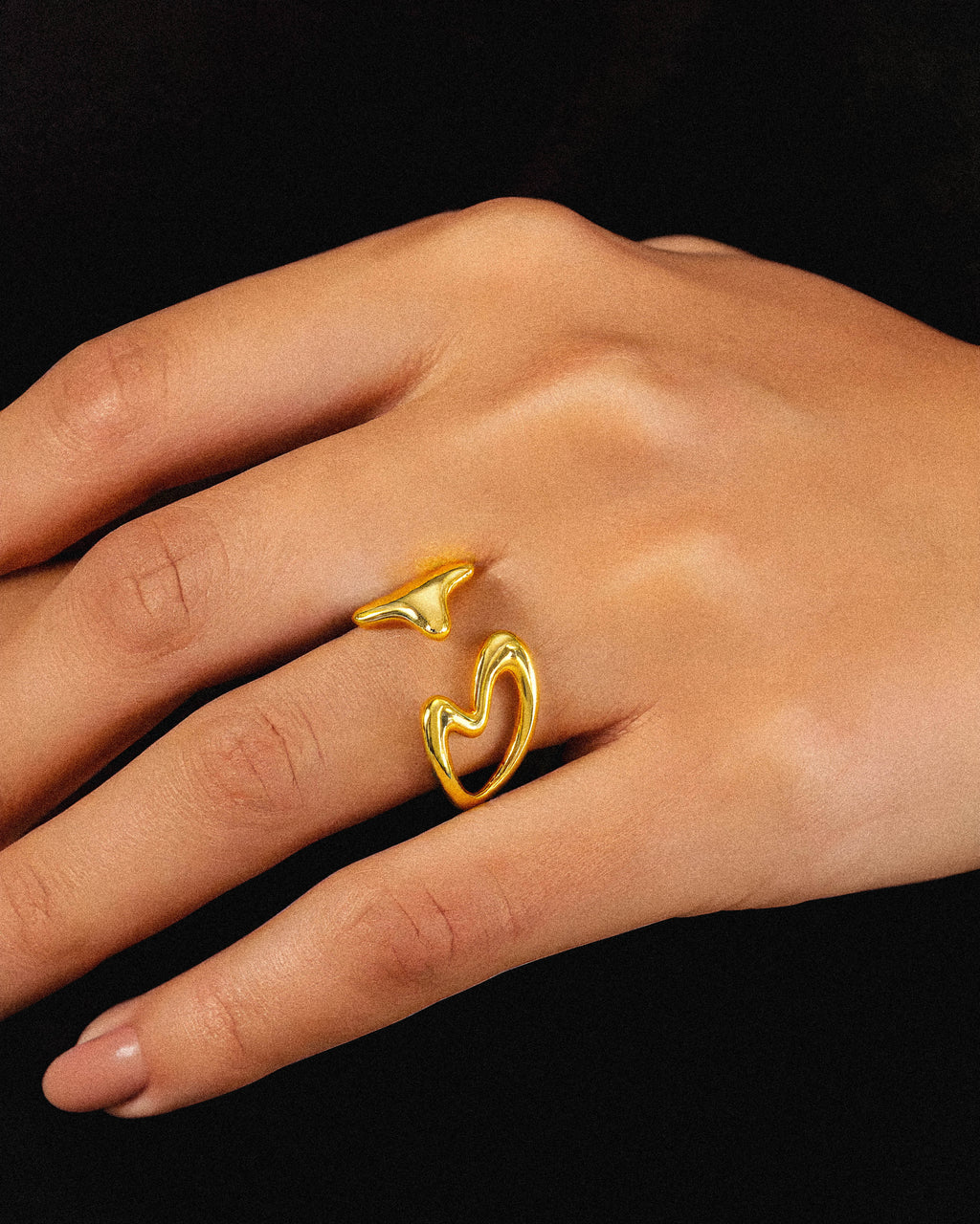 The Blushfire Ring embodies simplicity and minimalism, designed for those who value clean, elegant jewelry. Its sleek form ensures a comfortable fit while adding a subtle touch of sophistication to any outfit. Perfect for everyday wear, this ring highlights refined craftsmanship without unnecessary embellishments. on a woman's ring 1.	18k gold plated jewelry
	2.	gold plated stainless steel jewelry
	3.	tarnish free gold jewelry
	4.	waterproof gold jewelry
	5.	affordable gold jewelry
	6.	non-tarnish gold jewe