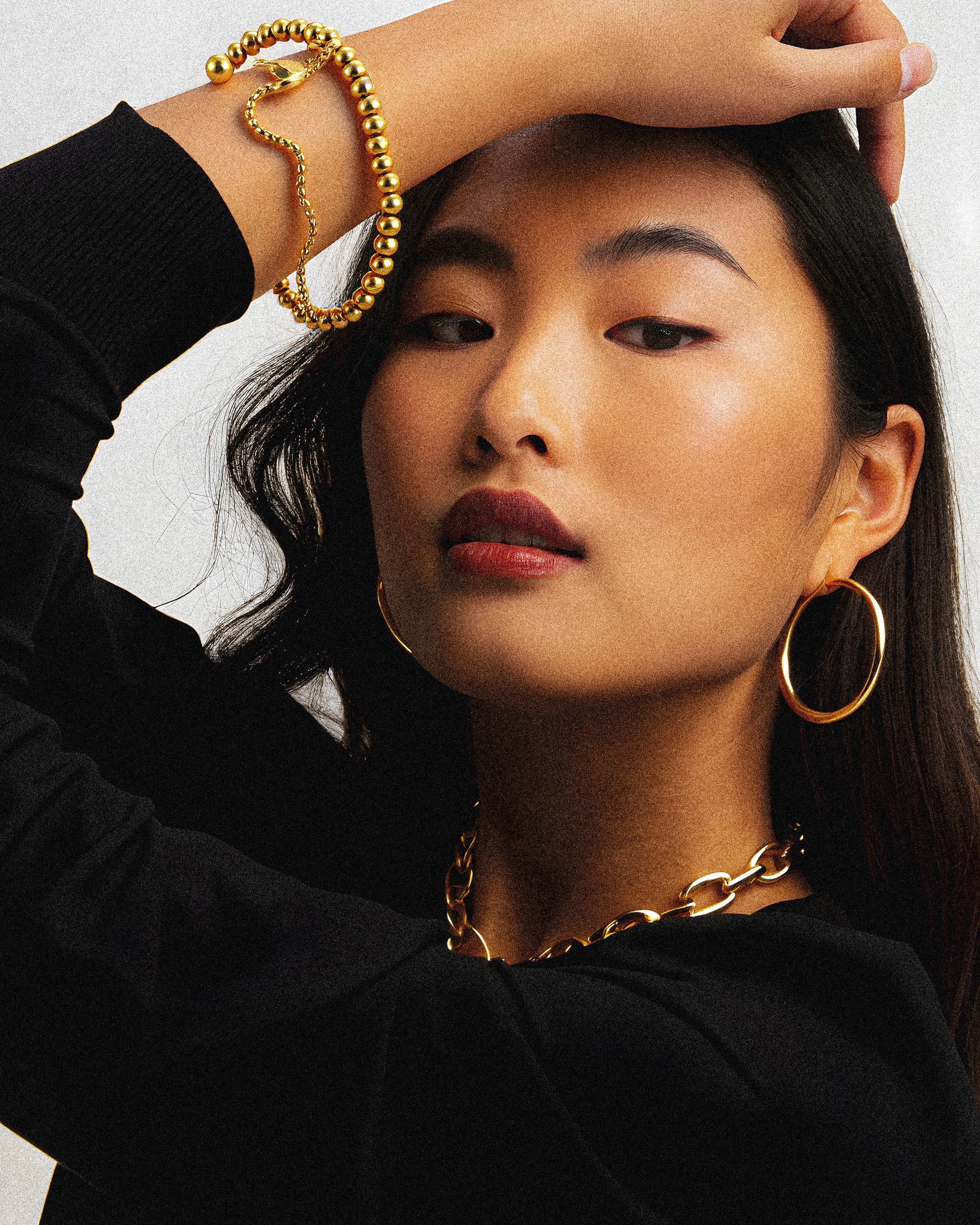 The Nestleline Bracelet, featuring elegant gold marbles finished in 18k gold plating. This finely crafted piece combines timeless design with durable materials, offering both sophistication and lasting shine. Ideal for adding a refined touch to any outfit, the bracelet exemplifies expert craftsmanship and subtle luxury. 1.	18k gold plated jewelry
	2.	gold plated stainless steel jewelry
	3.	tarnish free gold jewelry
	4.	waterproof gold jewelry
	5.	affordable gold jewelry
	6.	non-tarnish gold jewelry
	7.	hypo
