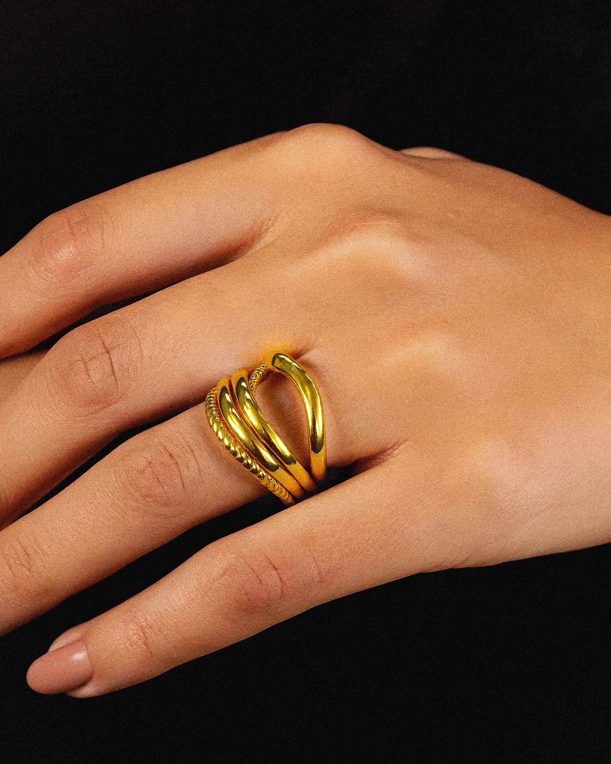 Crafted from solid gold, the Oath Ring features a classic round design that symbolizes enduring commitment. Its durable construction ensures lasting wear, making it an ideal choice for meaningful occasions or everyday sophistication. This ring combines expert craftsmanship with a minimalist aesthetic, offering both style and substance in one refined piece. 1.	18k gold plated jewelry
	2.	gold plated stainless steel jewelry
	3.	tarnish free gold jewelry
	4.	waterproof gold jewelry
	5.	affordable gold jewelry
